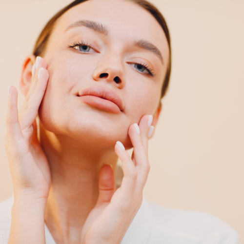 woman touching face for face lift