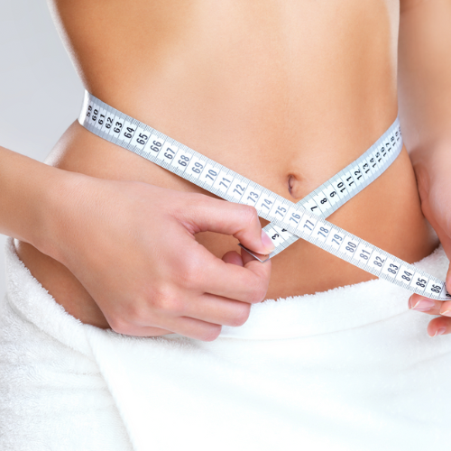 woman measuring waist for semaglutide